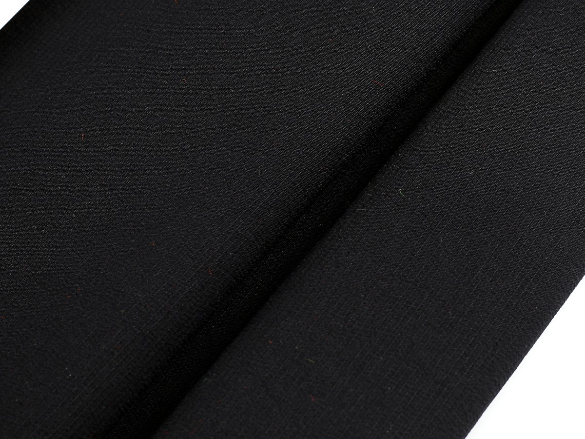 Dark uniform fabric detail for apparel supply programs