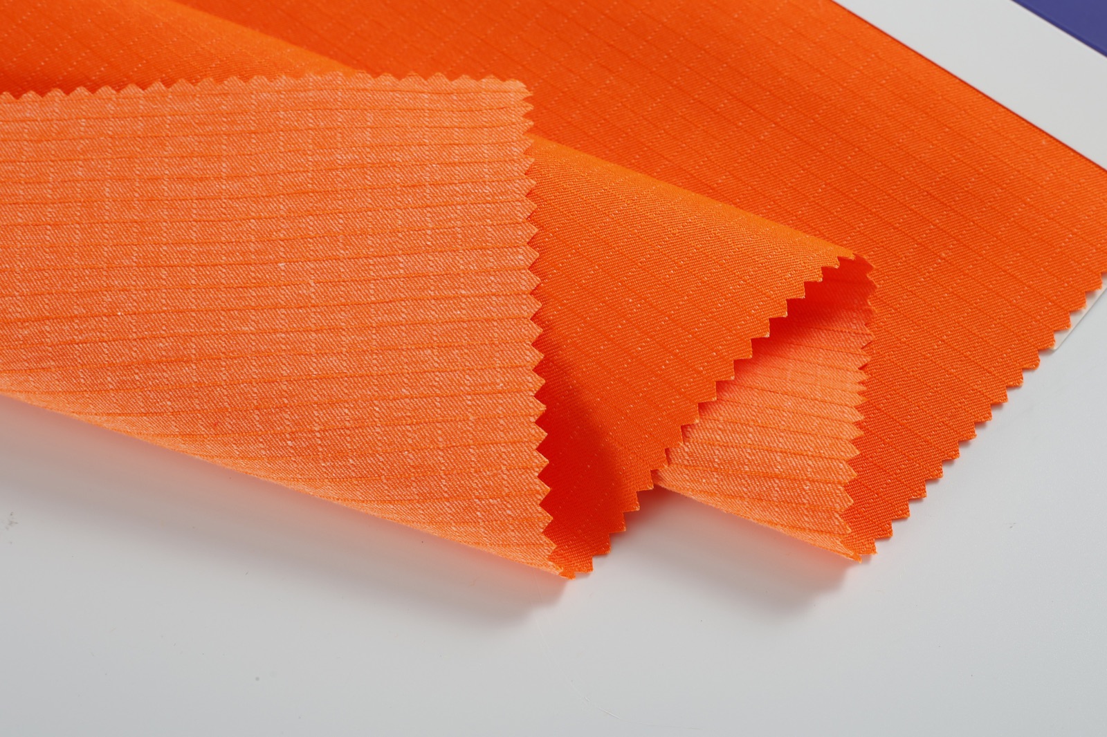 Actual HM023 high-visibility orange TC ripstop fabric sample