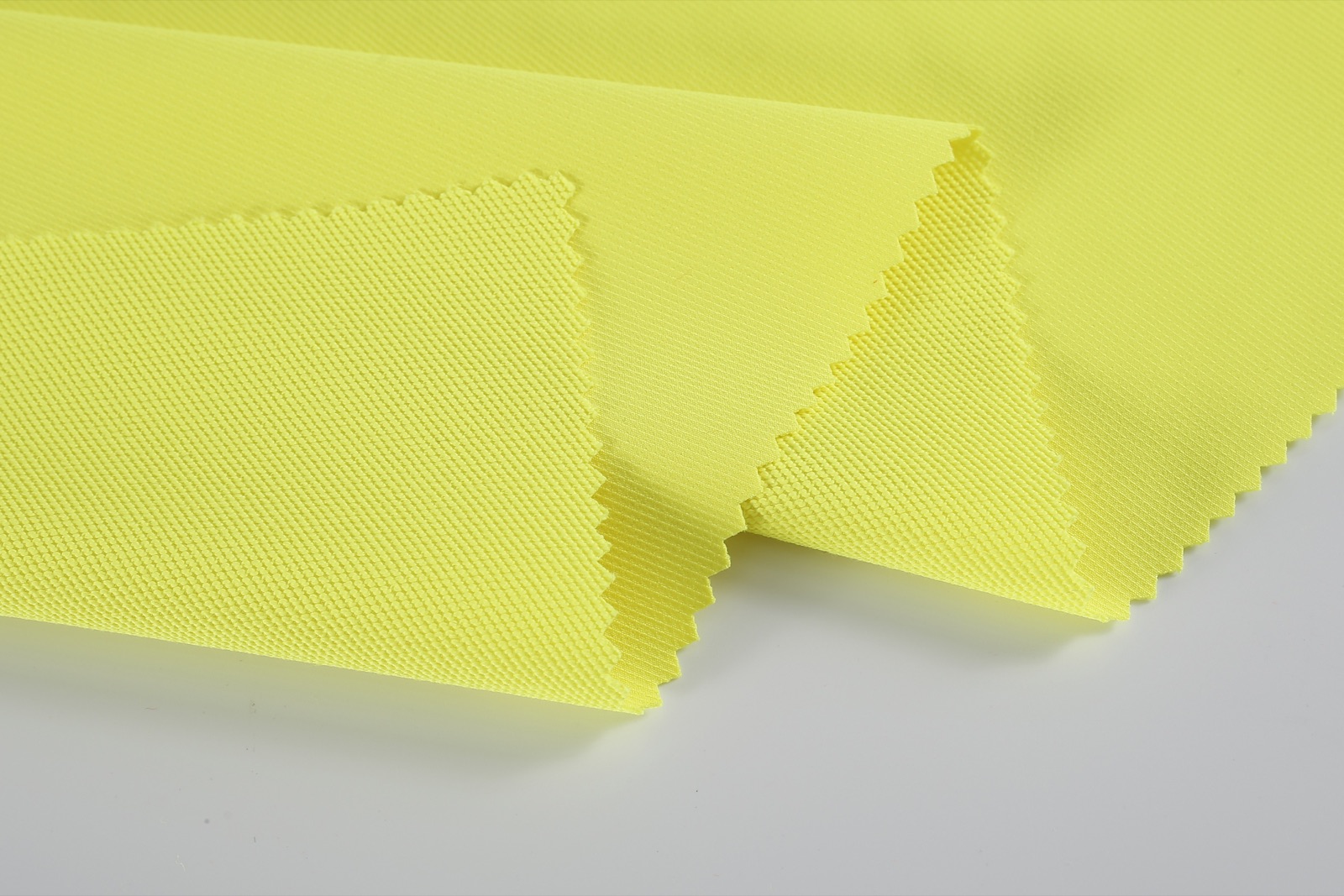 HM038 high visibility yellow stretch fabric detail view one