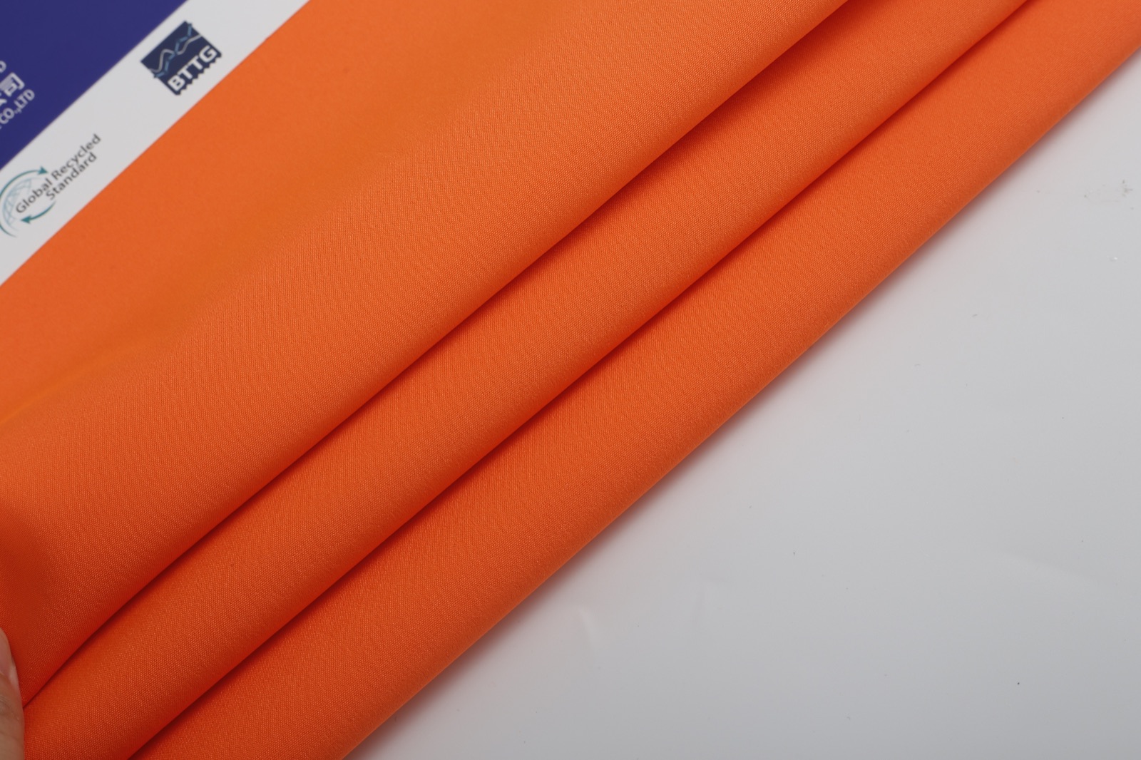HM039 fluorescent orange workwear fabric detail